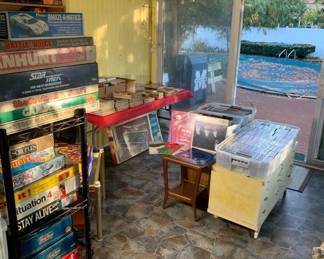 Sun room full of vintage Board Games, Vinyl Records, CDs, Comics, Magazines, Books, Bibles, and more!