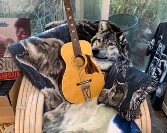 Wolf section with blankets, figurines, plates, single stitch shirt, wall art, more.