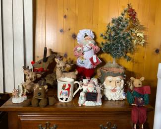 Reindeer, Santas, and trees. 