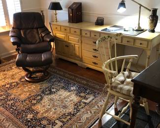 Close Up view of Leather Recliner & Foot Stool, Desk & Chair, Carpet, Various Lamps, Vintage Knife Box & Quantico, VA Etching in Back