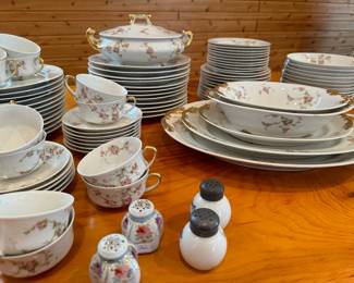 12 place place setting  Limoges china with serving pieces. 