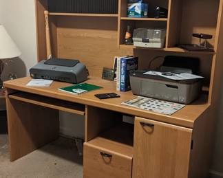 Computer desk with office items