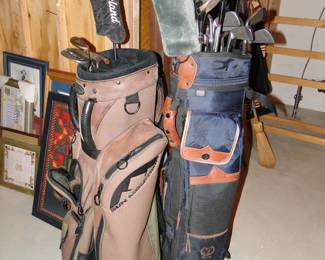 Two golf bags, complete with clubs