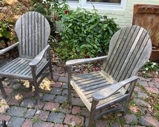 Weathered wood patio chairs.