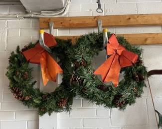 Pair of holiday wreaths.