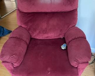 Red suede recliner.