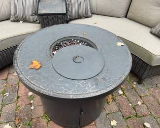 Six-seater patio set with firepit and bench.