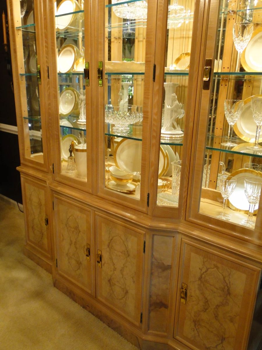 Large mirrored backed China cabinet to display all your beautiful pieces.