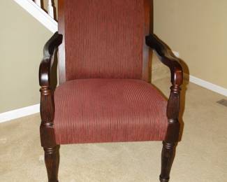 Solid wood frame and arms on this comfortable occasional chair