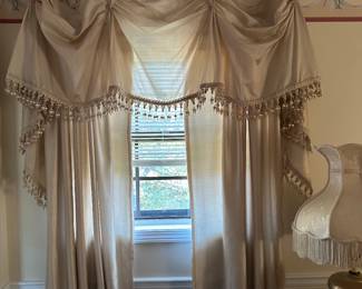 There are five windows of these curtains.  