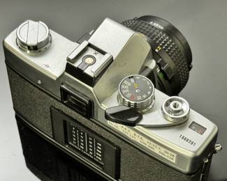 Minolta SRT201 Vintage 35mm SLR Camera w/ 50mm 1.7 Lens SRT-201	3.75x5.75x3.5in	1lbs 14.5 oz	970020
