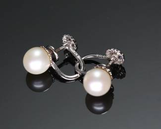 14kt White Gold & Pearl Clip-On Earrings 14k 	13x7x15mm Pearl: 7mm	2.1 grams 	130024