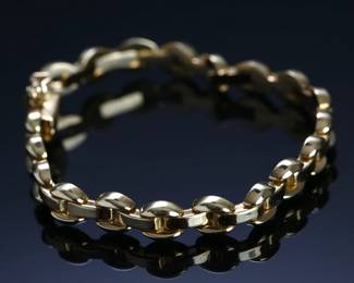 18kt Gold Italian Link Bracelet 18k Italy Size: 7in 	7in Long 7mm Wide 	17.30 grams 	626003
