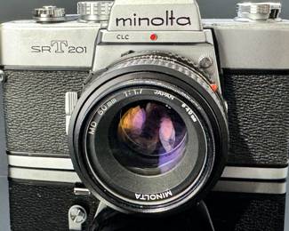 Minolta SRT201 Vintage 35mm SLR Camera w/ 50mm 1.7 Lens SRT-201	3.75x5.75x3.5in	1lbs 14.5 oz	970020
