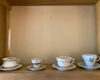 dainty teacups and saucers