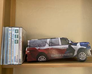 Texas Country Reporter DVD collection.  No wonder they retired--their back tires are flat.