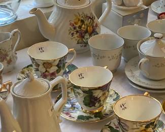 teapots, cups and saucers, glass candlesticks