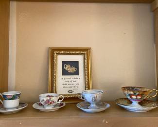 dainty teacups and saucers