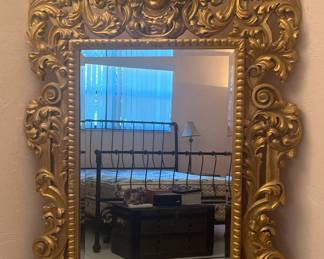 Very large orrnate gold leaf beveled mirror, 46" x 81"