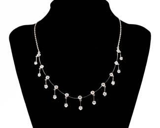 DIAMOND & 14K FESTOON NECKLACE | Having 22 full-cut diamonds set in 14k white gold, with 11 bezel-set stations, each with an articulated, prong-set diamond drop suspended from the chain, clasp signed with fineness mark, chain length approx. 15 in.; 13.81g