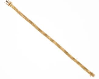 TIFFANY & CO. 18K YELLOW GOLD CHAIN BRACELET | Flexible chain bracelet, with double safety clasp signed "Tiffany & Co. 750"; 15.4g
w. 7 in.