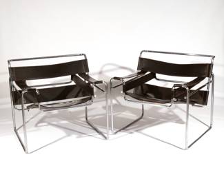PAIR WASSILY ARMCHAIRS | Chrome-plated steel and black leather, no apparent labels. h. 28-1/2 w. 27 d. 31 in.