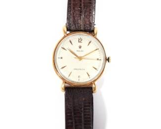 ROLEX PRECISION WRISTWATCH | With original brown leather band; 36g total weight. 