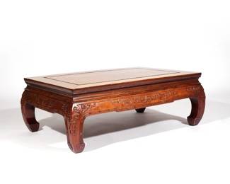 FINELY CARVED CHINESE KANG TABLE | 19th century, Huanghuali or similar fruitwood, of rectangular shape with finely-carved aprons and incurved legs decorated with archaistic scrollwork. h. 13-1/4 w. 37-1/4 d. 25-1/4 in.