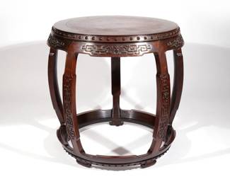 FINE CHINESE HONGMU & HUAMU BARREL-FORM TABLE | 19th century, drum or barrel-form, well-carved with archaistic scrollwork, the top inset with burled huamu. h. 32 w. 34 in. (approx.)