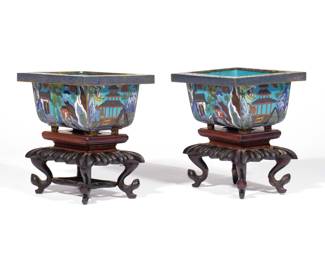 PAIR CHINESE CLOISONNE JARDINIERES | Depicting landscape scenes, with conforming carved wood stands. h. 3 w. 6 d. 4-1/2 in. (jardinieres). Overall: h. 6-1/2 in. (on stand)