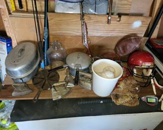 Retro cooking pots and pans, irons, and cast iron.  Old sporting goods