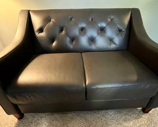 Beautiful Gray Tufted Leather Loveseat.