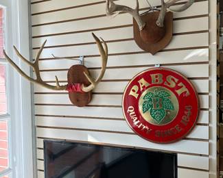 Mounted deer antlers,   WESTINGHOUSE television, PABST wall sign