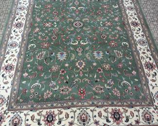 Fringed green, mauve, blue rug