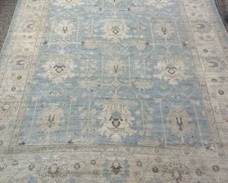 Light blue and cream area rug