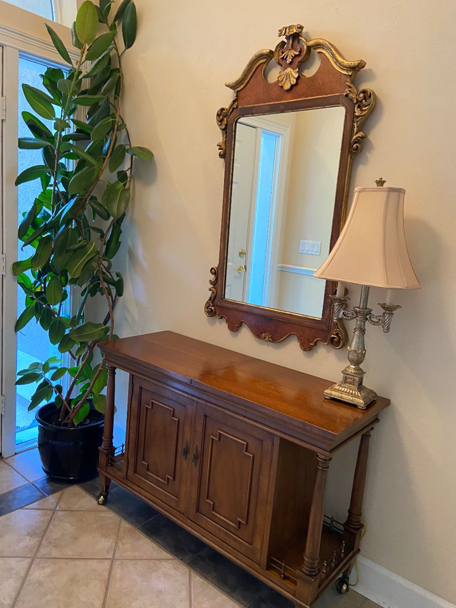 Traditional foyer table and mirror.