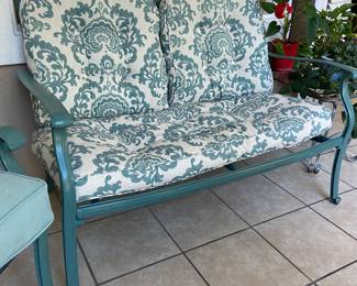 Turquoise wrought iron loveseat