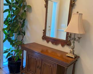Traditional foyer table and mirror.
