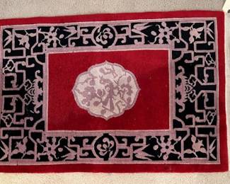 Chinese Wool Medallion Rug Having Red Ground With Black Border