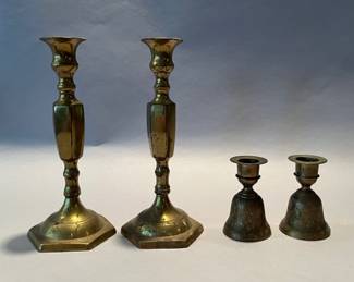 Two Pairs Of Brass Candlesticks