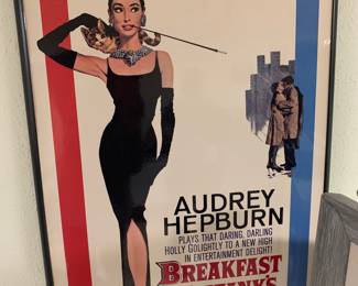 many framed posters and prints. Audrey is just one example.