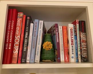 many cookbooks and bins of cooking magazines