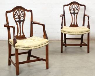 A pair of George III style carved mahogany armchairs
19th century