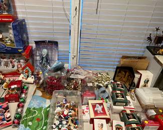Hundreds of Christmas ornaments including Hallmark Keepsake.