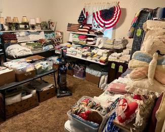 Room full of nice linens, blankets, pillows & more!