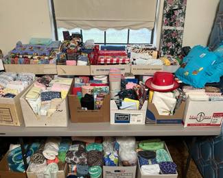 Now to the sewing room - loaded with fabric, ribbon, knitting, patterns, etc.