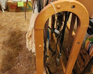 Nice quilt rack loaded with belts