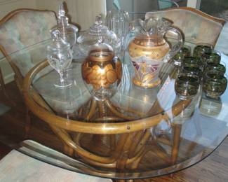 glass top bamboo table and 4 chairs, antique candy dishes and pitcher, waterford biscuit jar, cera roly poly 22k grape and ivy pattern glasses, crystal vase