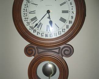 One of several antique wall clocks