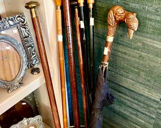 CANES AND UMBRELLAS INCLUDING COMOY'S DOG HEAD UMBRELLA.